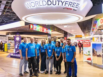 Duncan Goose with the Heathrow World Duty Free store team.jpg