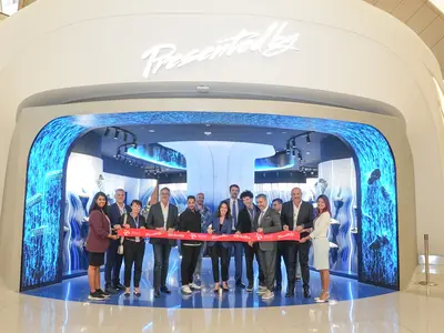 Presented By store Abu Dhabi ribbon cutting image