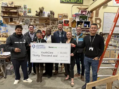 Journey For Good: photo of large cheque giving moment to Seattle's Youth Care