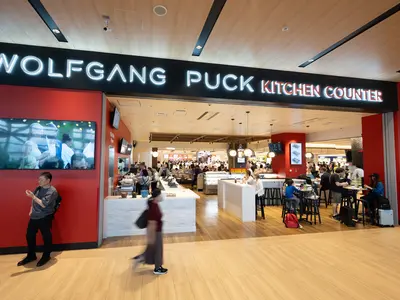 Image of Wolfgang Puck Kitchen Counter store front in KIX airport