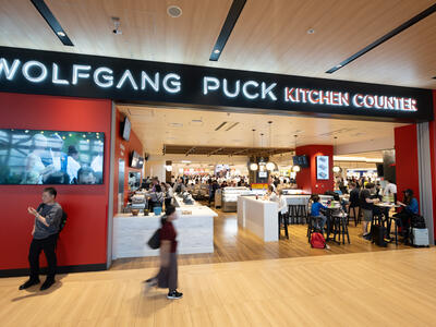 Image of Wolfgang Puck Kitchen Counter store front in KIX airport