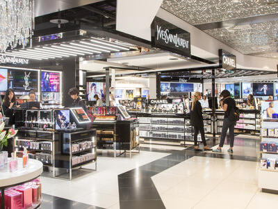 Dufry Launches New Generation Store At Heathrow Terminal 3 - View across tri axis brand personalisations - World Duty Free - Dufry - 17091