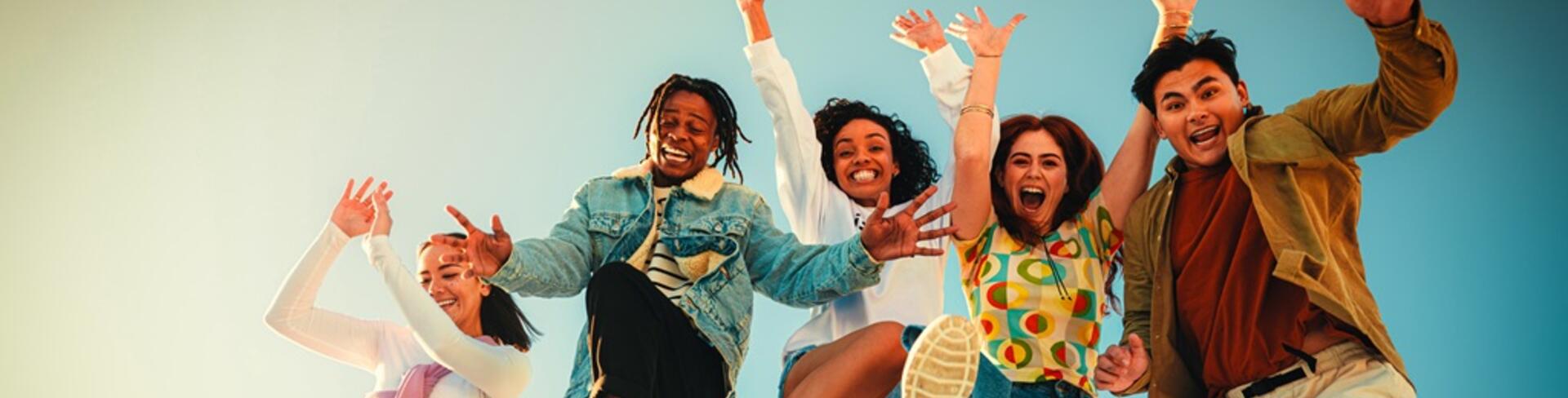 Colleagues jumping in the air