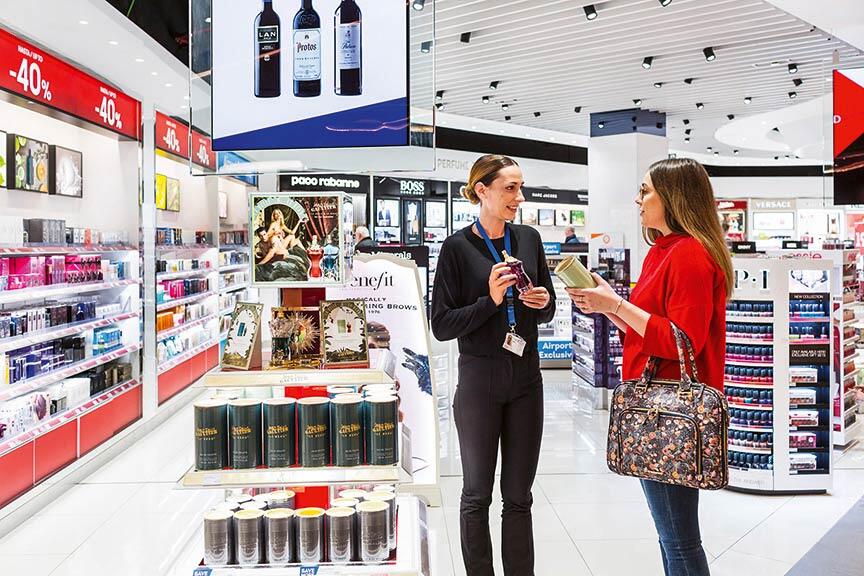 A female customer and female employee talking in a shop