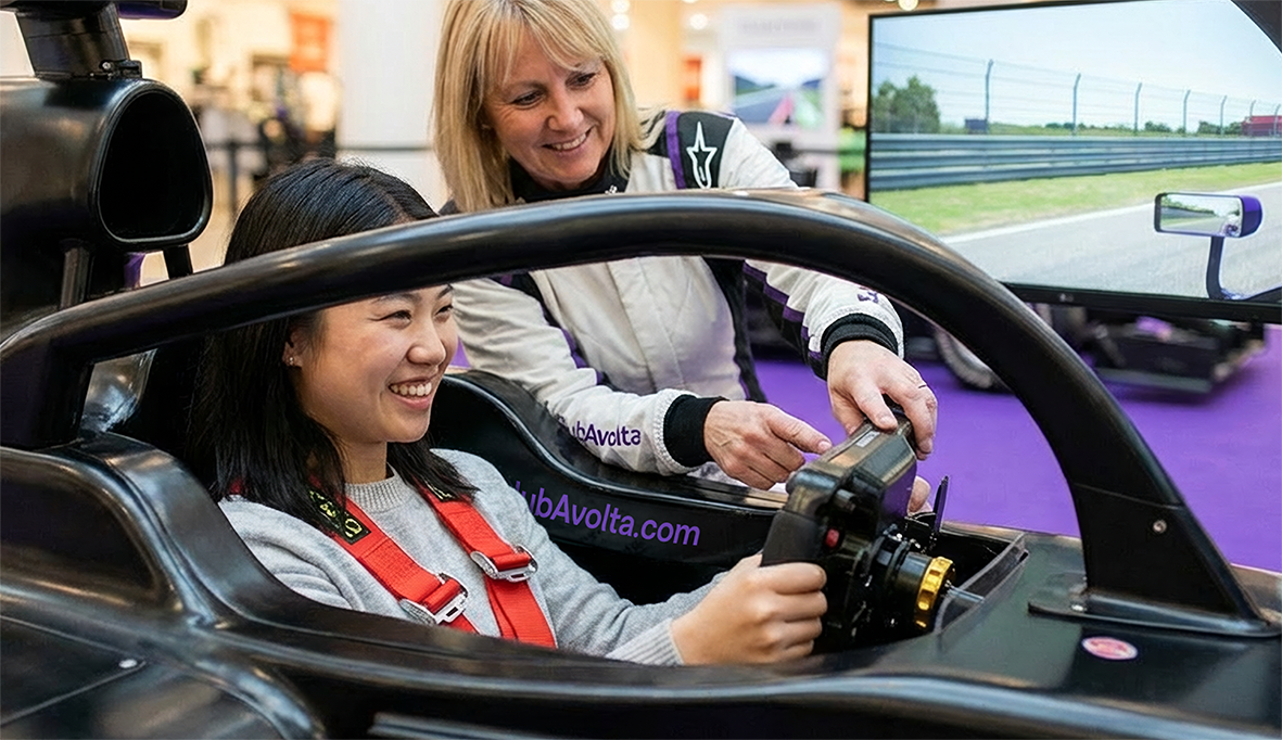 Two smiling women inside a car