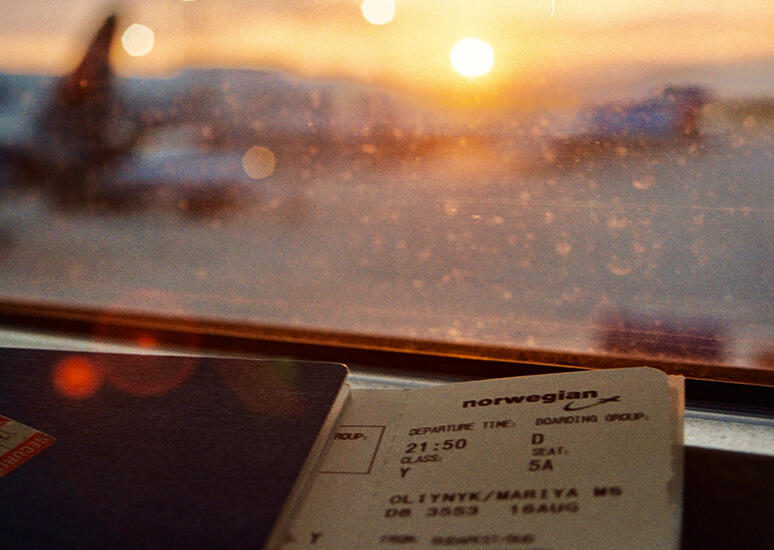 view of an airport, the sun is setting