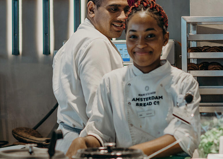 two chefs in a kitchen