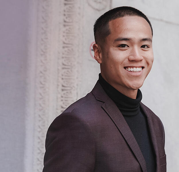 a young man smiling